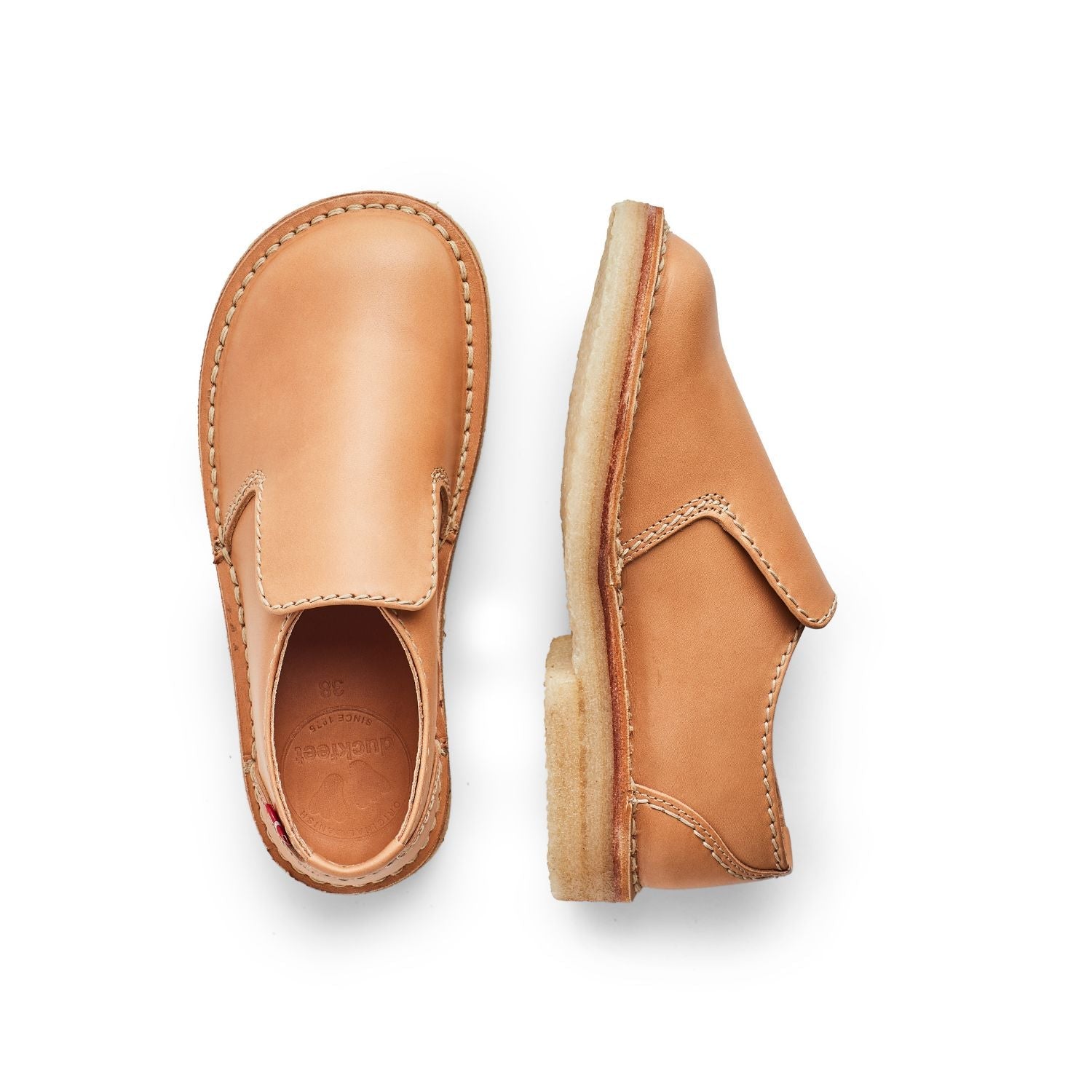 Duckfeet Falster Bio slip-on leather shoe, top and inner side view on white background