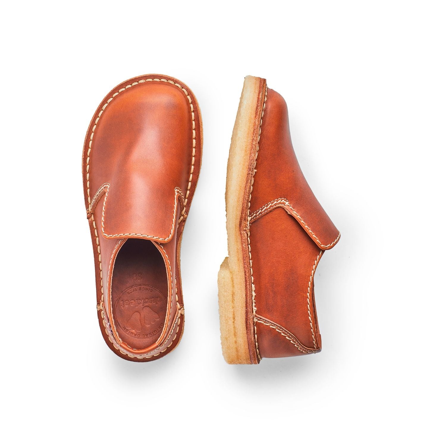 Duckfeet Falster Brown slip-on leather shoe, top and inner side view on white background