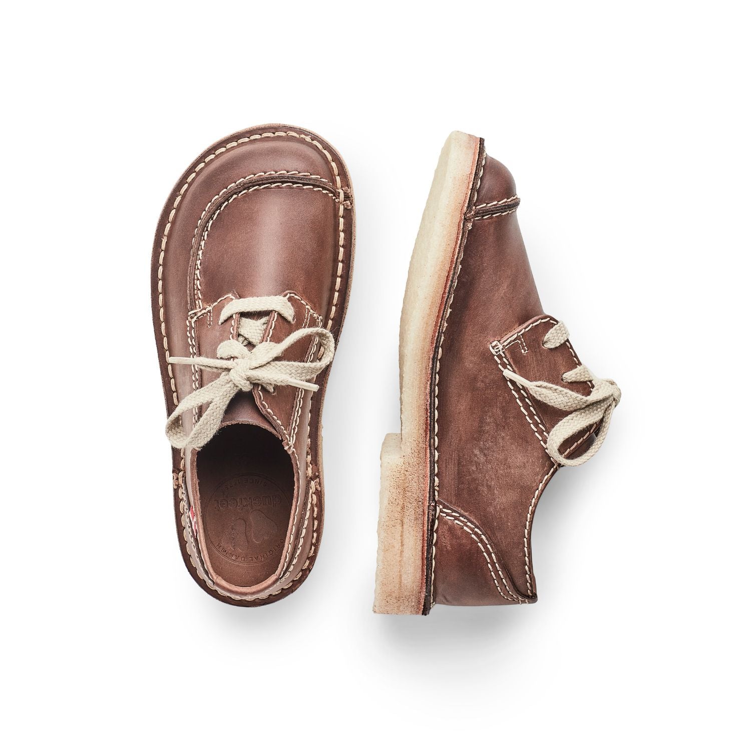 Duckfeet Fyn Cocoa moc-toe leather derby shoe, top and inner side view on white background