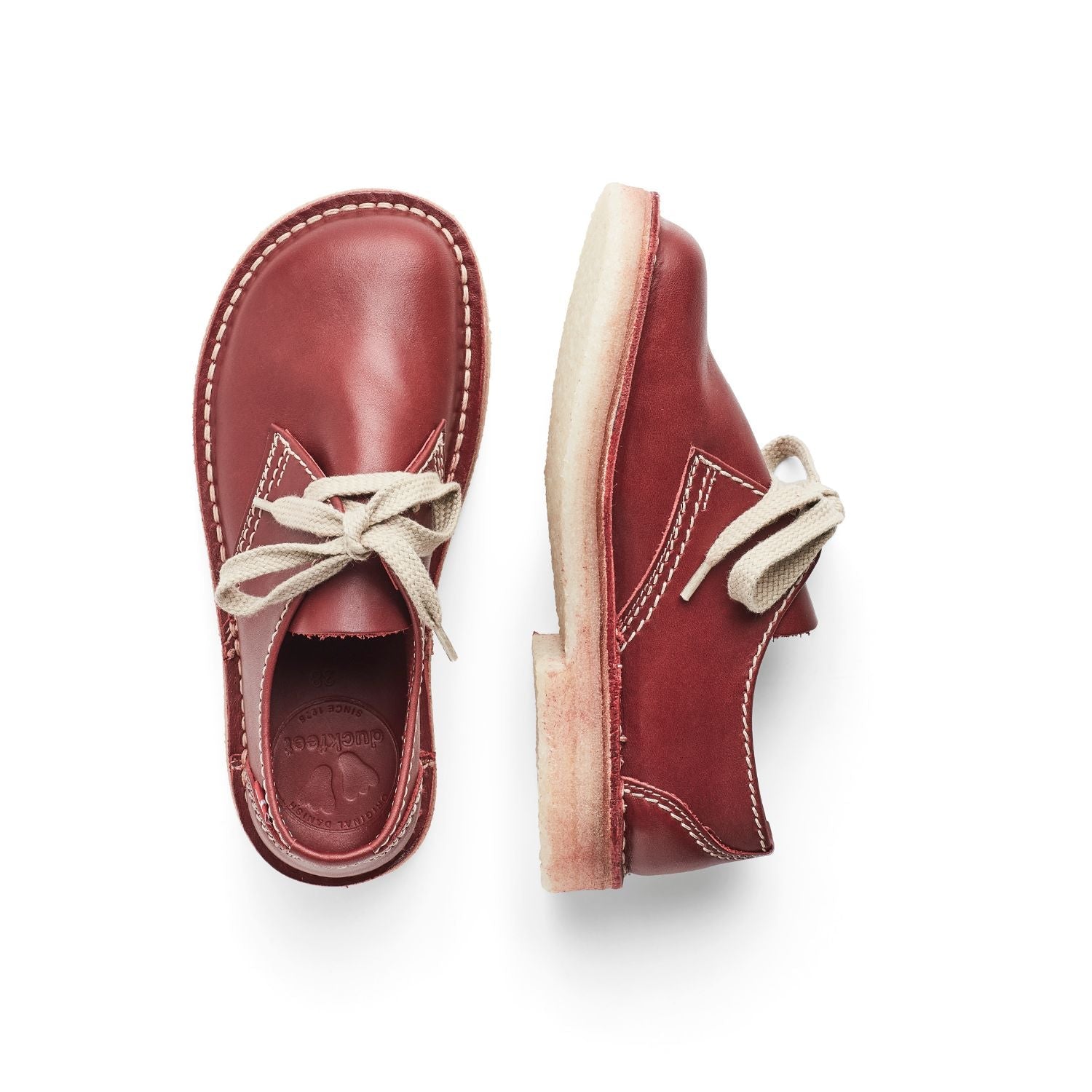 Duckfeet Jylland Granate leather derby shoe, top and inner side view on white background