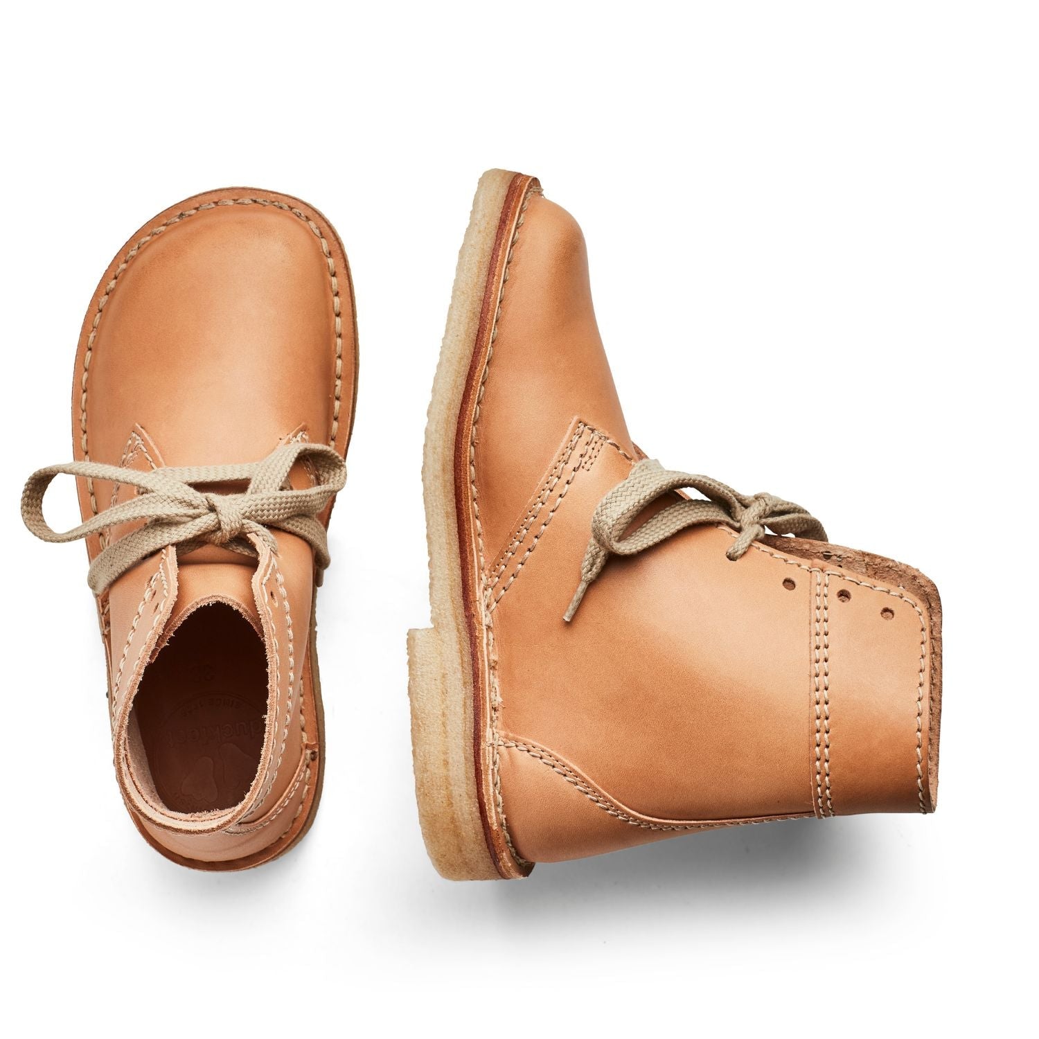 Duckfeet Fåborg Bio lace-up leather boot, top and inner side view on white background