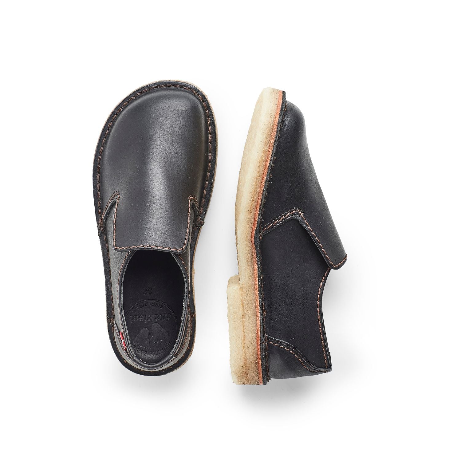 Duckfeet Falster Black slip-on leather shoe, top and inner side view on white background