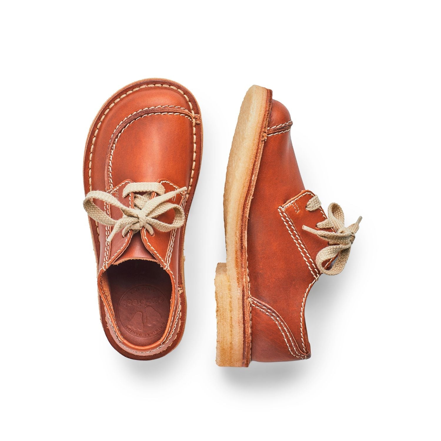 Duckfeet Fyn Brown moc-toe leather derby shoe, top and inner side view on white background