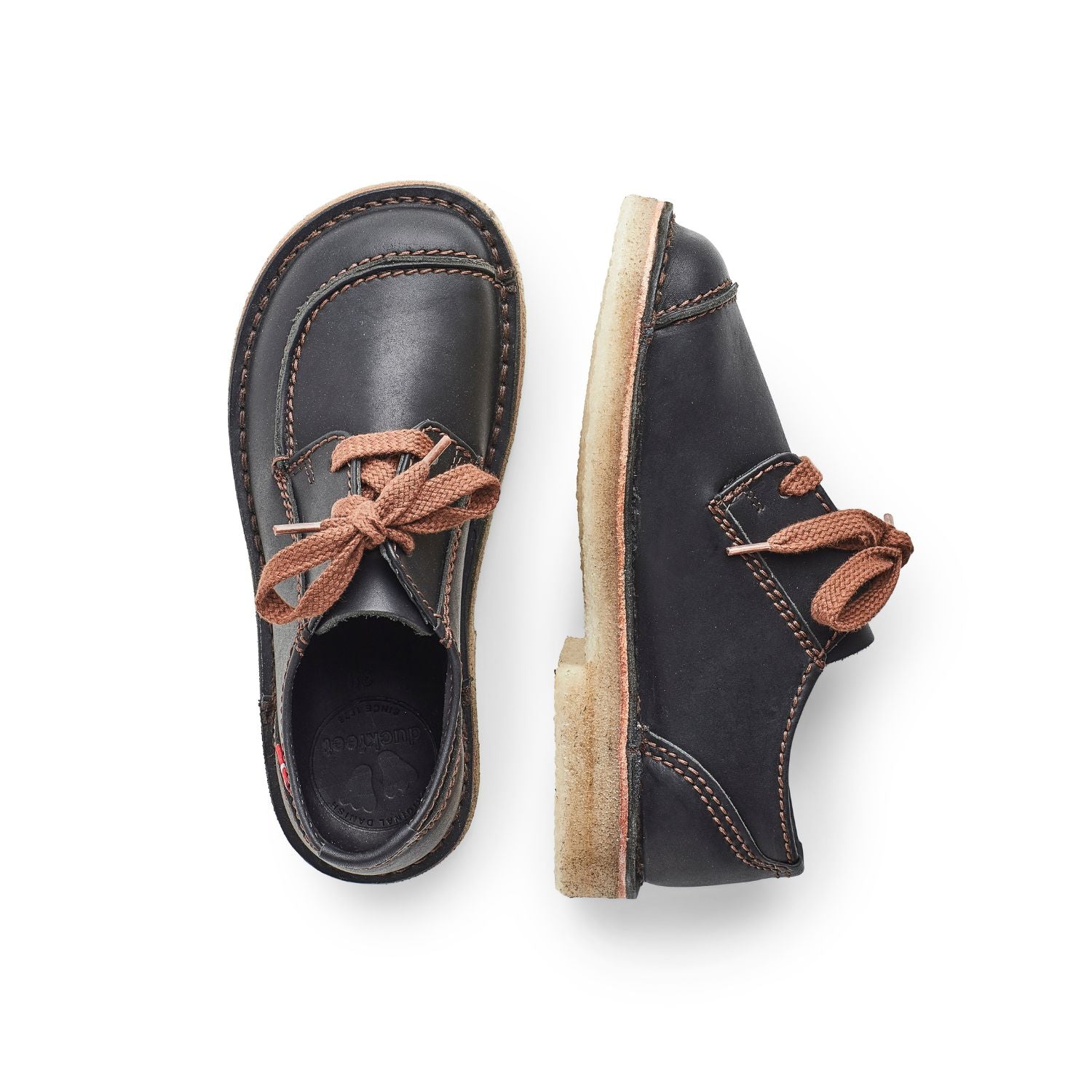 Duckfeet Fyn Black moc-toe leather derby shoe, top and inner side view on white background