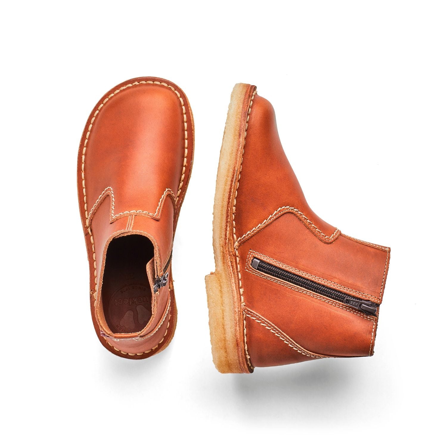 Duckfeet Korsør Brown zip-up leather ankle boot, top and inner side view on white background