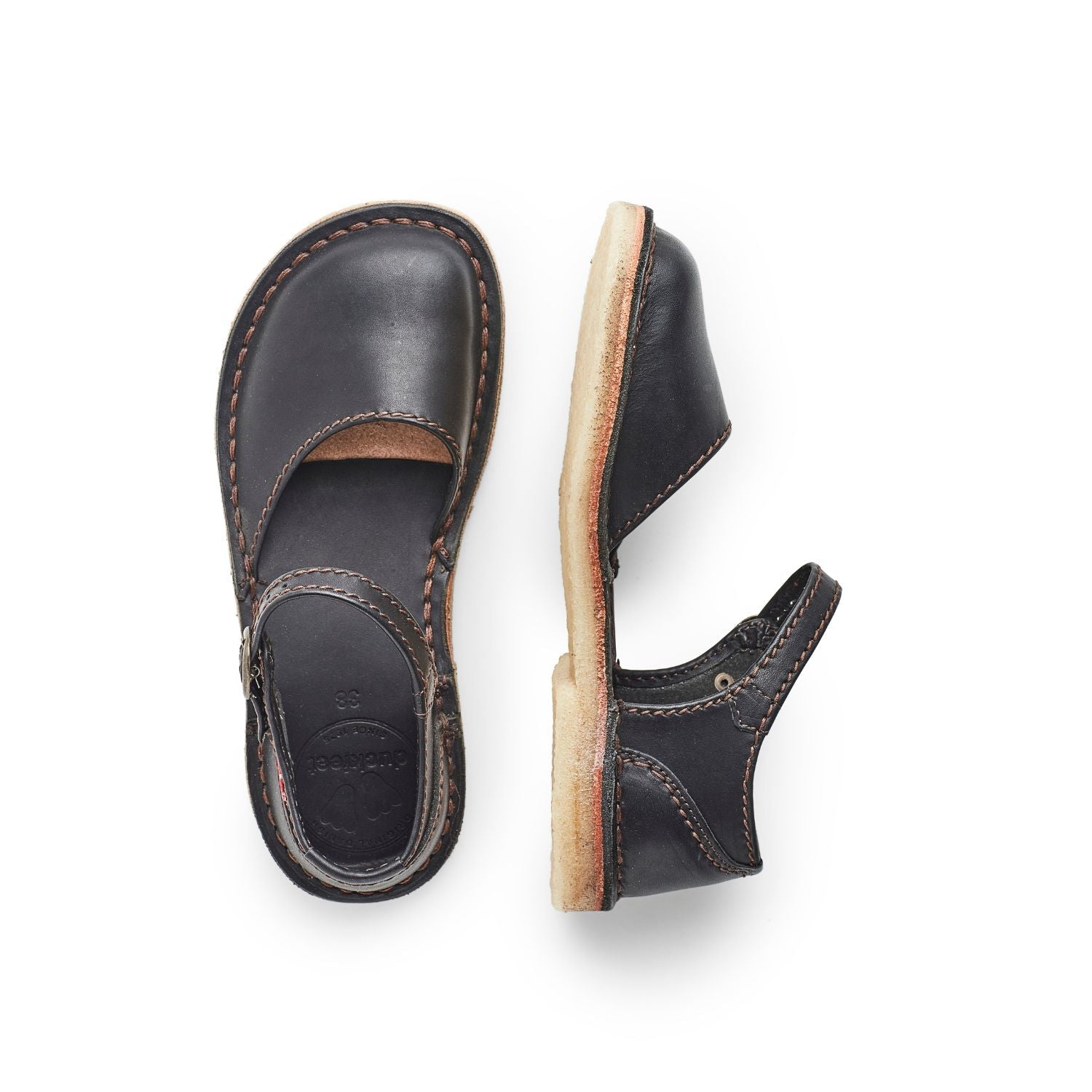 Duckfeet Mols Black closed-toe leather sandal, top and inner side view on white background